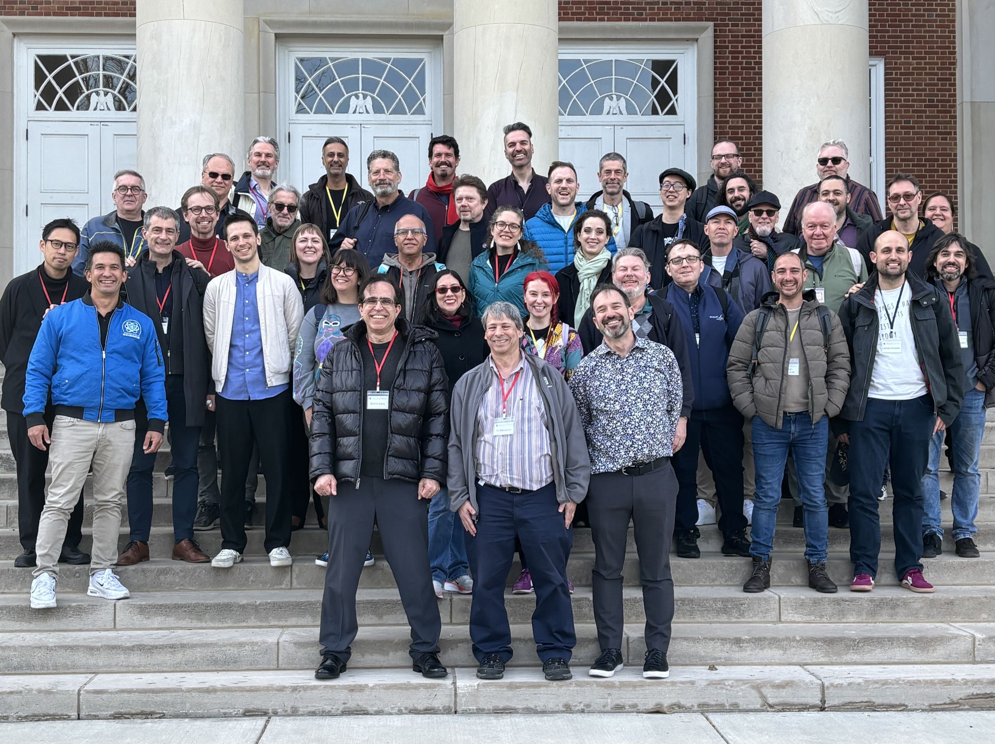 Group photograph of attendees at a maths and magic gathering